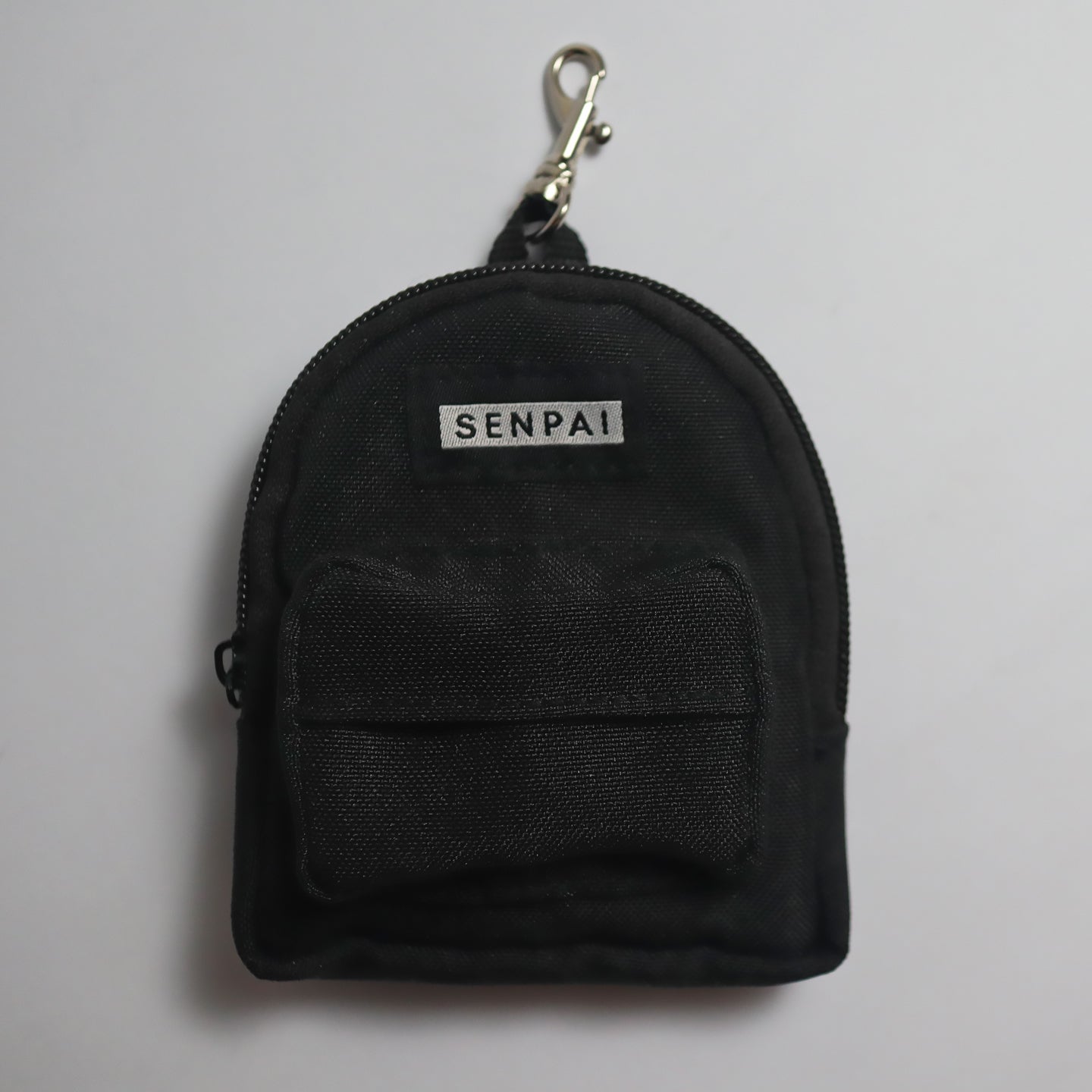 Miniature black sales backpack